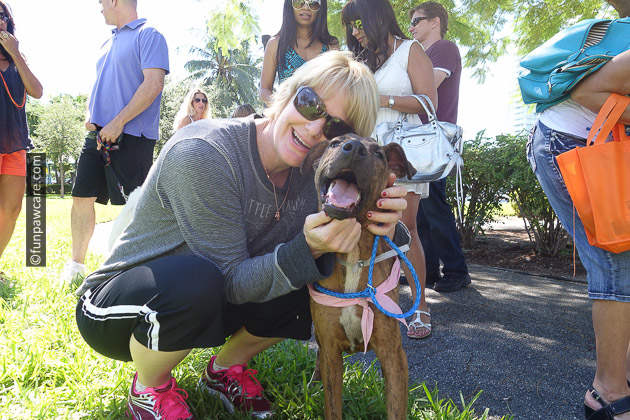 blond woman with homeless dog