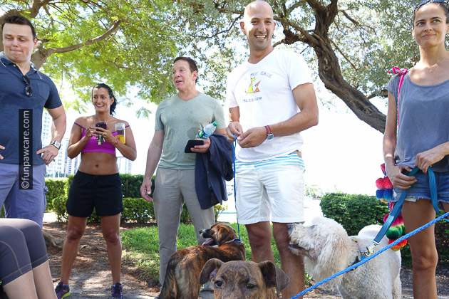 Russell Hartstein and Steve Guttenberg with friends at dog event