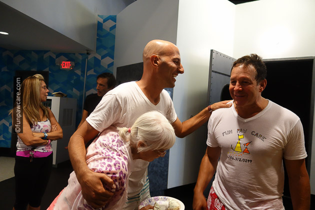 Russell Hartstein and Steve Guttenberg cracking up