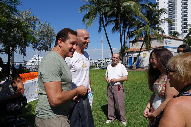 Russell Hartstein and Steve Guttenberg sighing autographs