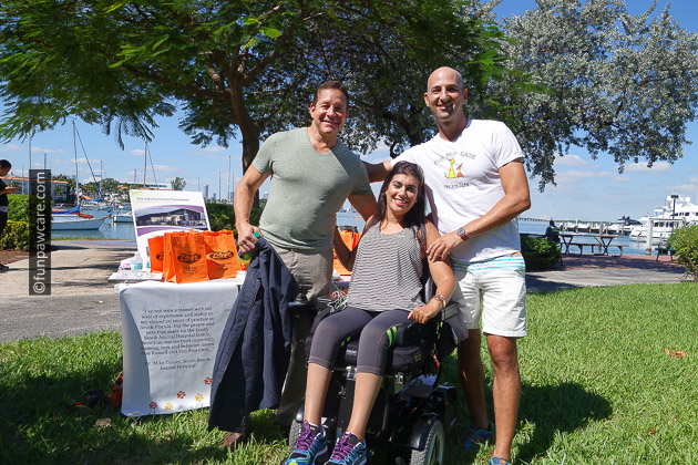 Russell Hartstein and Steve Guttenberg and Sabrina Cohen with wheelchair 