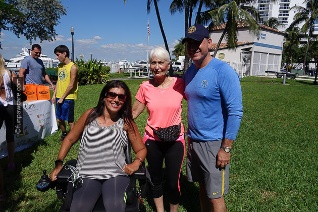 The mayor of Miami Beach and 2 lady friends in a wheel chair
