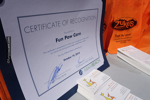 Russell Hartstein and Fun Paw Care award from city for service dog training miami