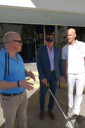 Steve Guttenberg, Russell Hartstein walking outside with blindfold