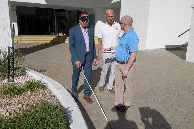 Steve Guttenberg, Russell Hartstein walking with blindfold on